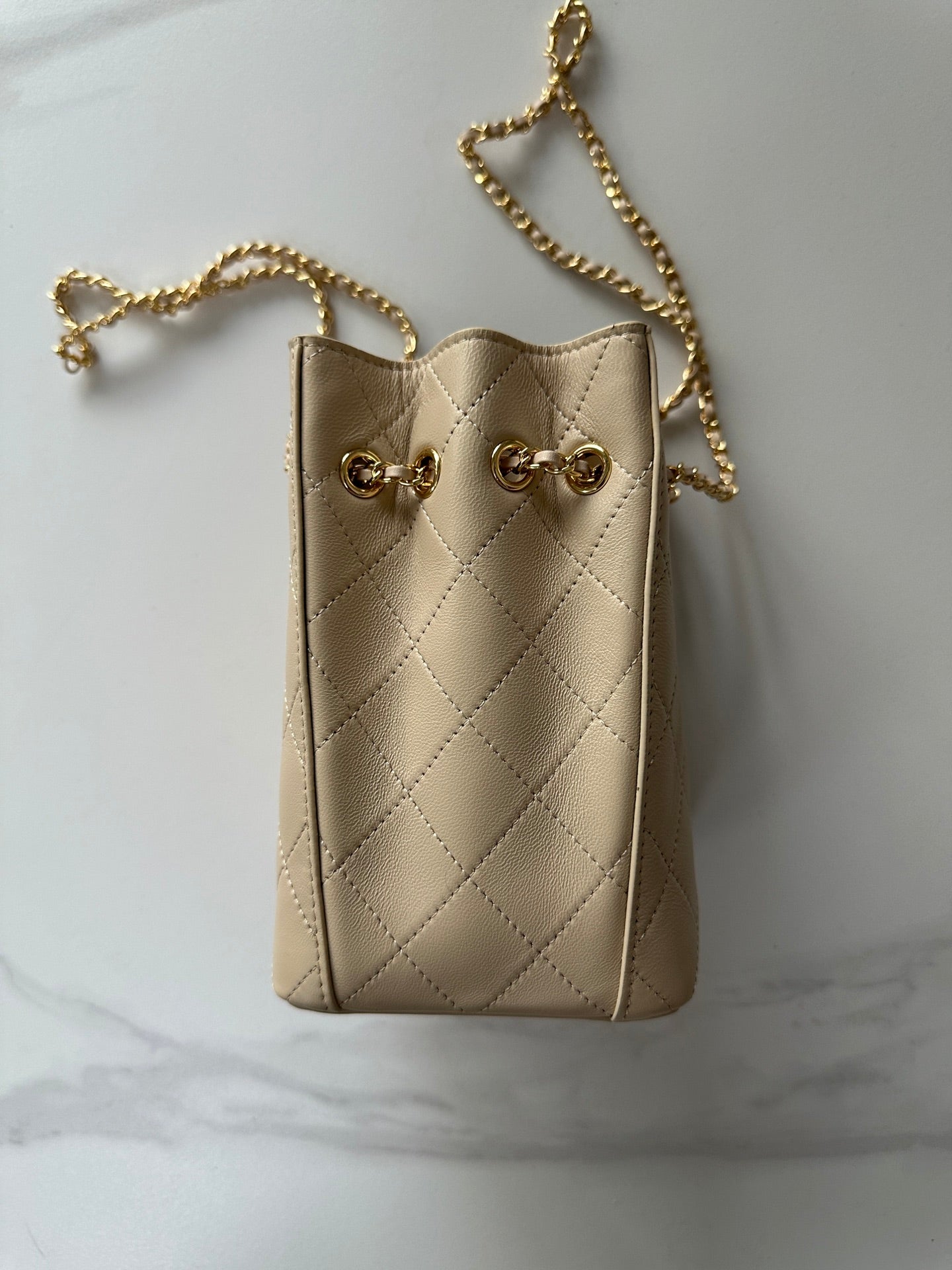 CHANEL 26S MINI BUCKET BAG 18 IN BEIGE QUILTED CALFSKIN GOLD HARDWARE