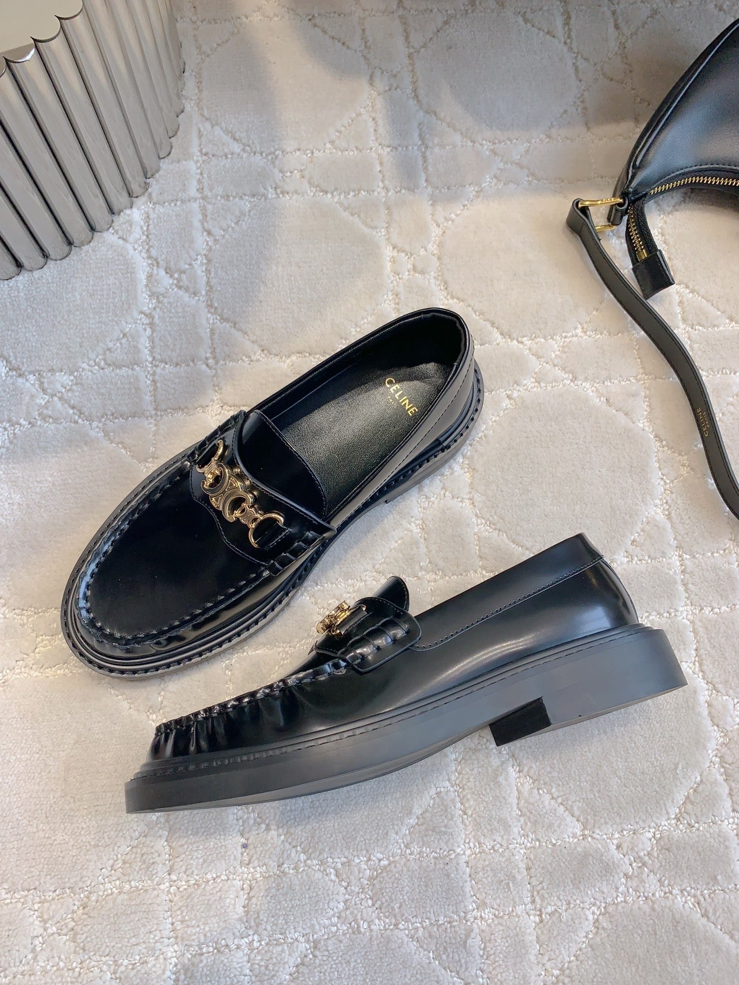 CELINE 25S ARC DE TRIOMPHE LOAFERS IN BLACK SHINY CALFSKIN GOLD HARDWARE