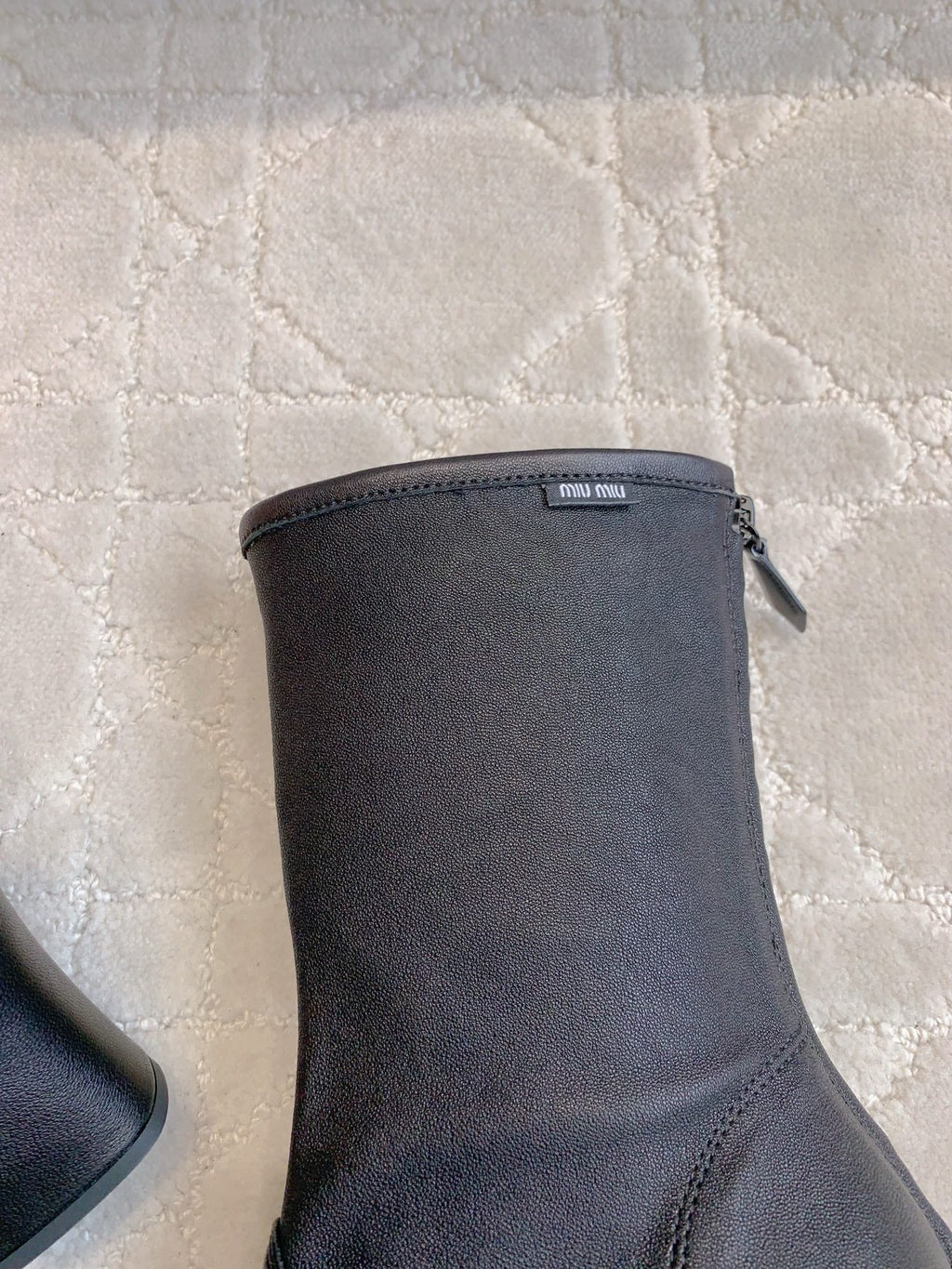 MIUMIU 26S HIGH-HEELED ANKLE BOOTS 70MM IN BLACK CALFSKIN