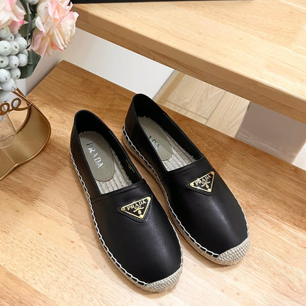 PRADA 26S LOGO ESPADRILLE SLIP ON FLATS IN BLACK CALFSKIN