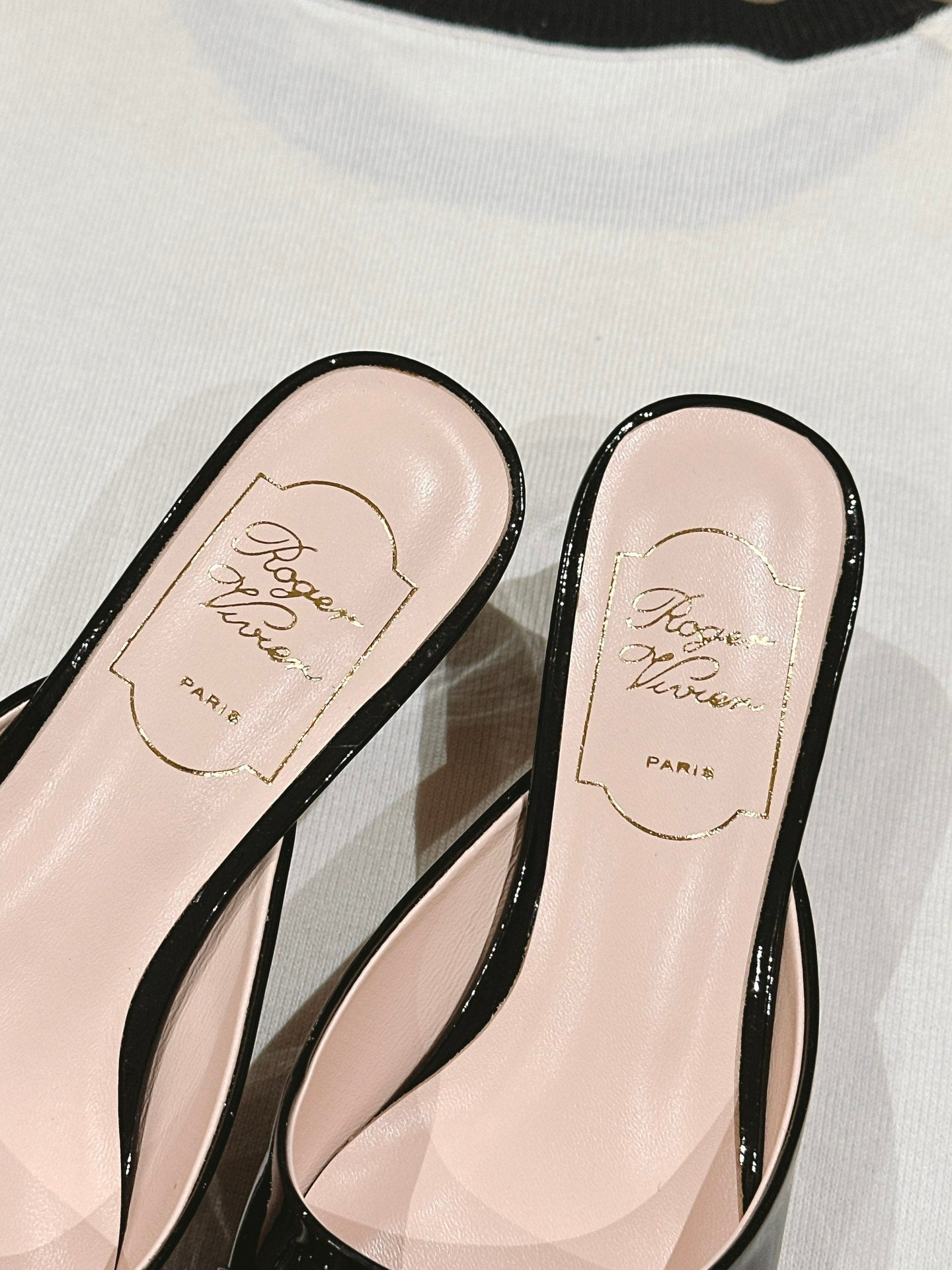 CRYSTAL HEEL MULE IN BLACK PATENT CALFSKIN WITH EMBELLISHED BUCKLE