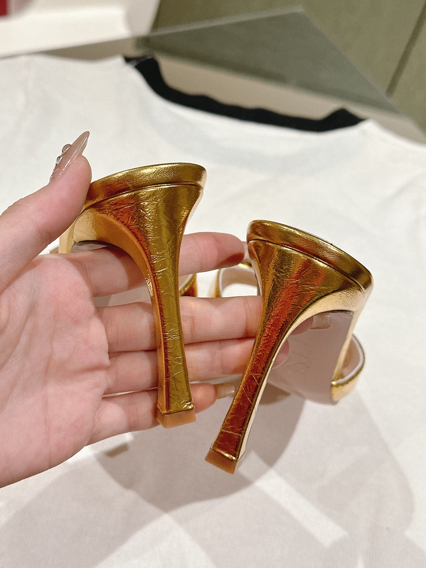 TRUMPET METALLIC MULES IN GOLD PATENT CALFSKIN