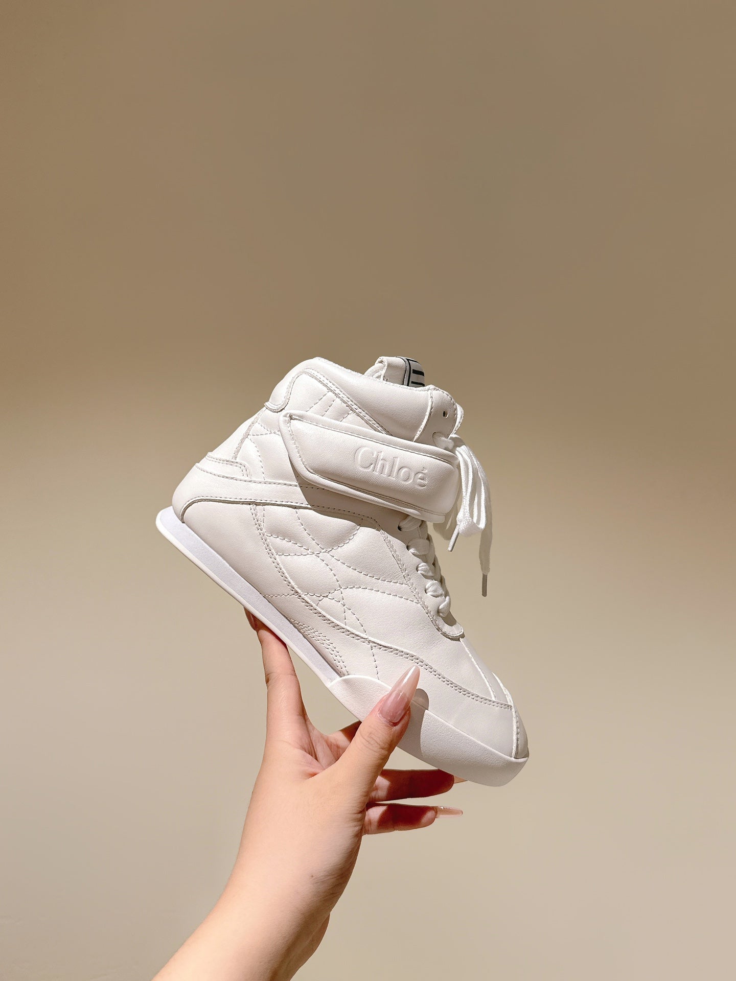 CHLOÉ 26S HIGH-TOP SNEAKERS IN WHITE CALFSKIN