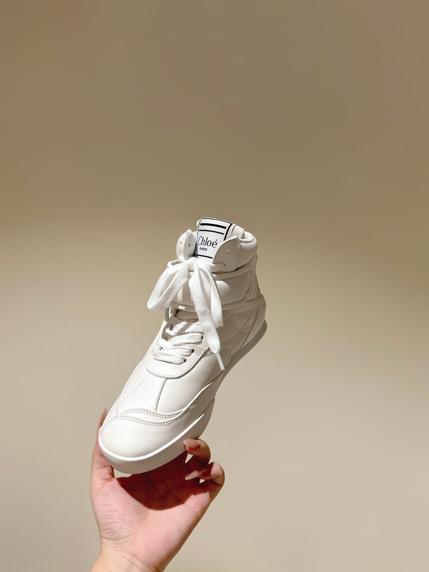 CHLOÉ 26S HIGH-TOP SNEAKERS IN WHITE CALFSKIN