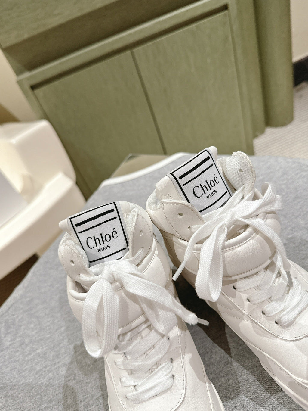 CHLOÉ 26S HIGH-TOP SNEAKERS IN WHITE CALFSKIN