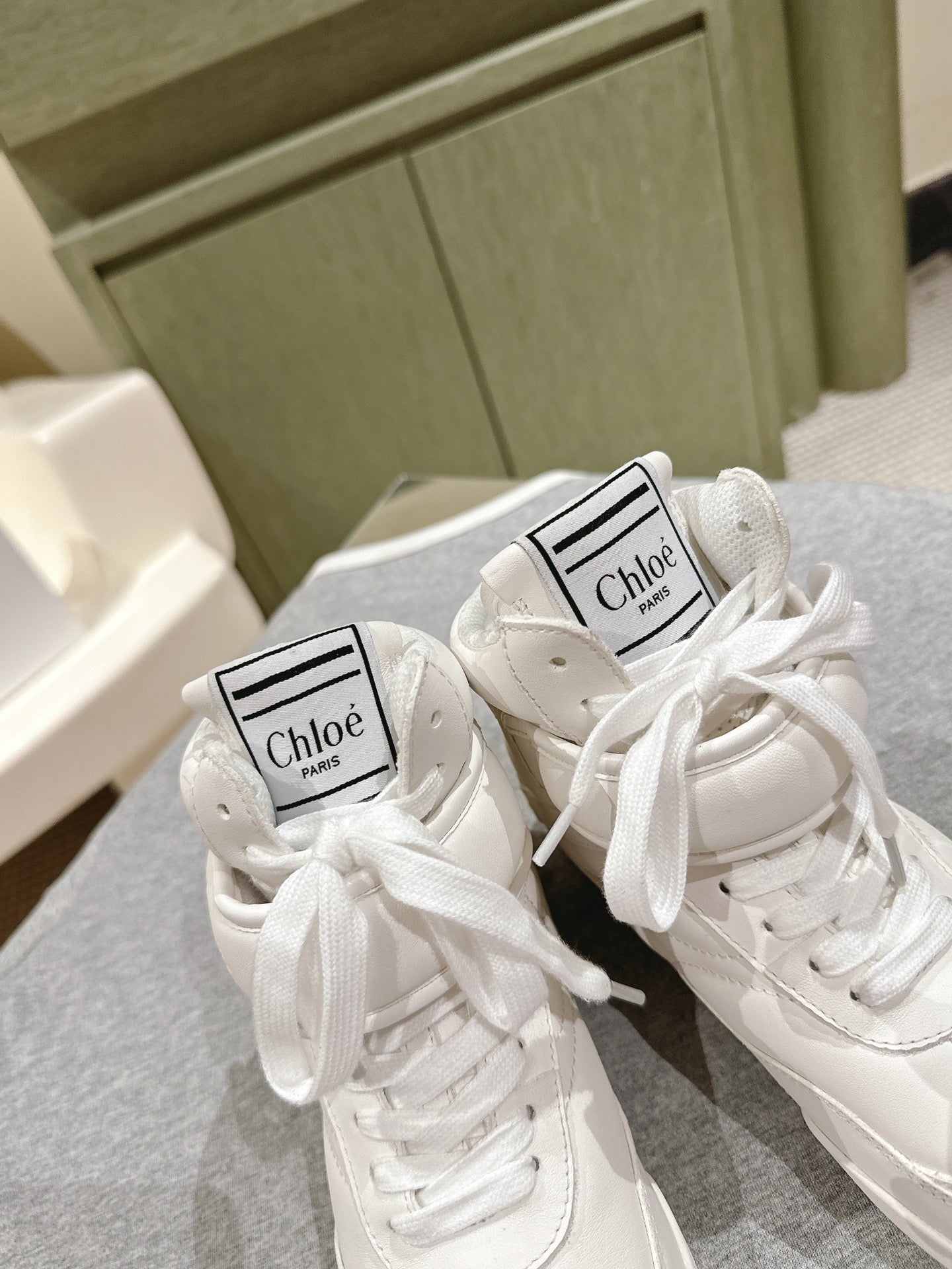 CHLOÉ 26S HIGH-TOP SNEAKERS IN WHITE CALFSKIN