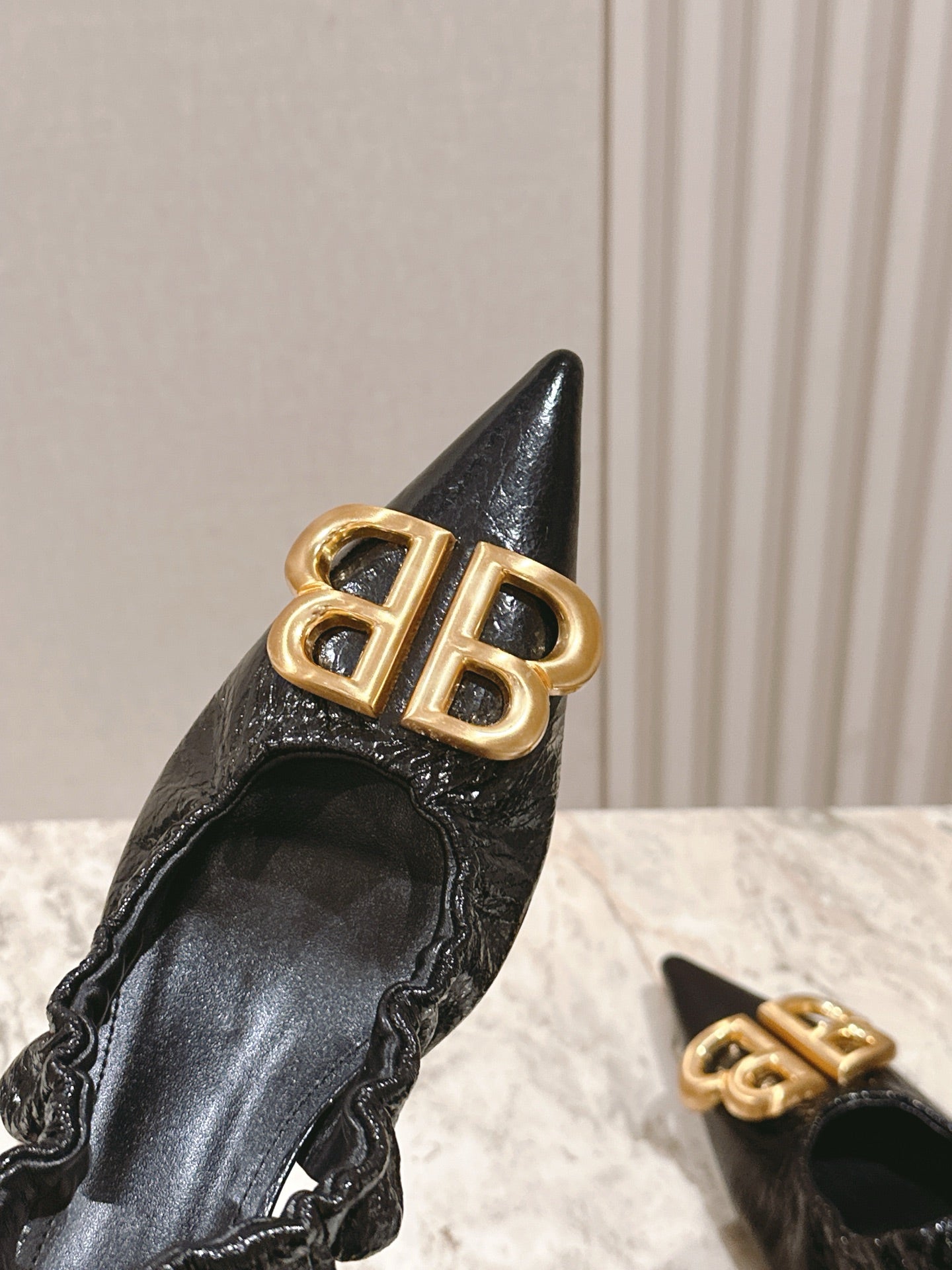 BALENCIAGA 25S HIGH SLINGBACK 45 MM IN BLACK LAMBSKIN WITH GOLD HARDWARE