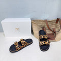 THE ROW 26S DOUBLE STRAP SLIDE SANDALS IN LEOPARD PRINT CALF HAIRCALFSKIN