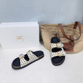 THE ROW 26S DOUBLE STRAP SLIDE SANDALS IN WHITE POLKA DOT CALF HAIR CALFSKIN