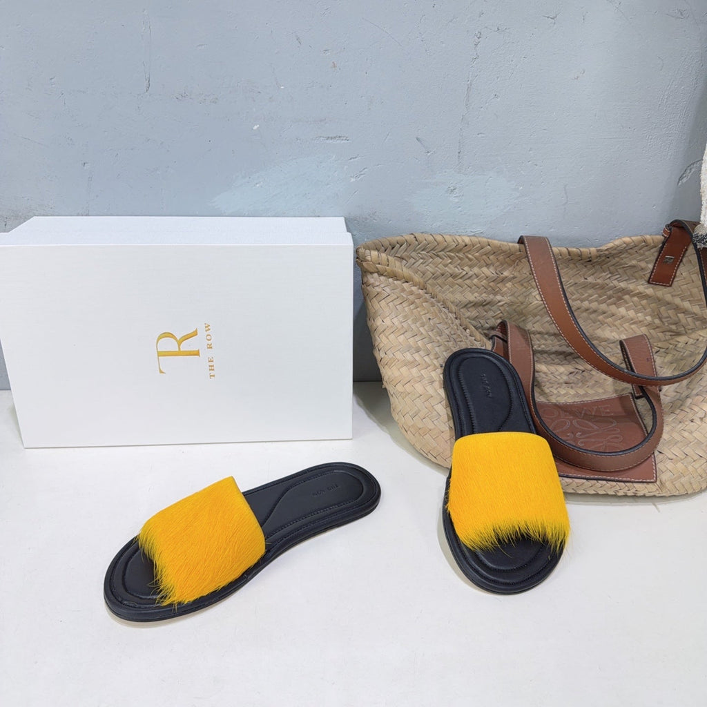 THE ROW 26S SLIDES SANDALS IN YELLOW MINK FUR AND BLACK CALFSKIN