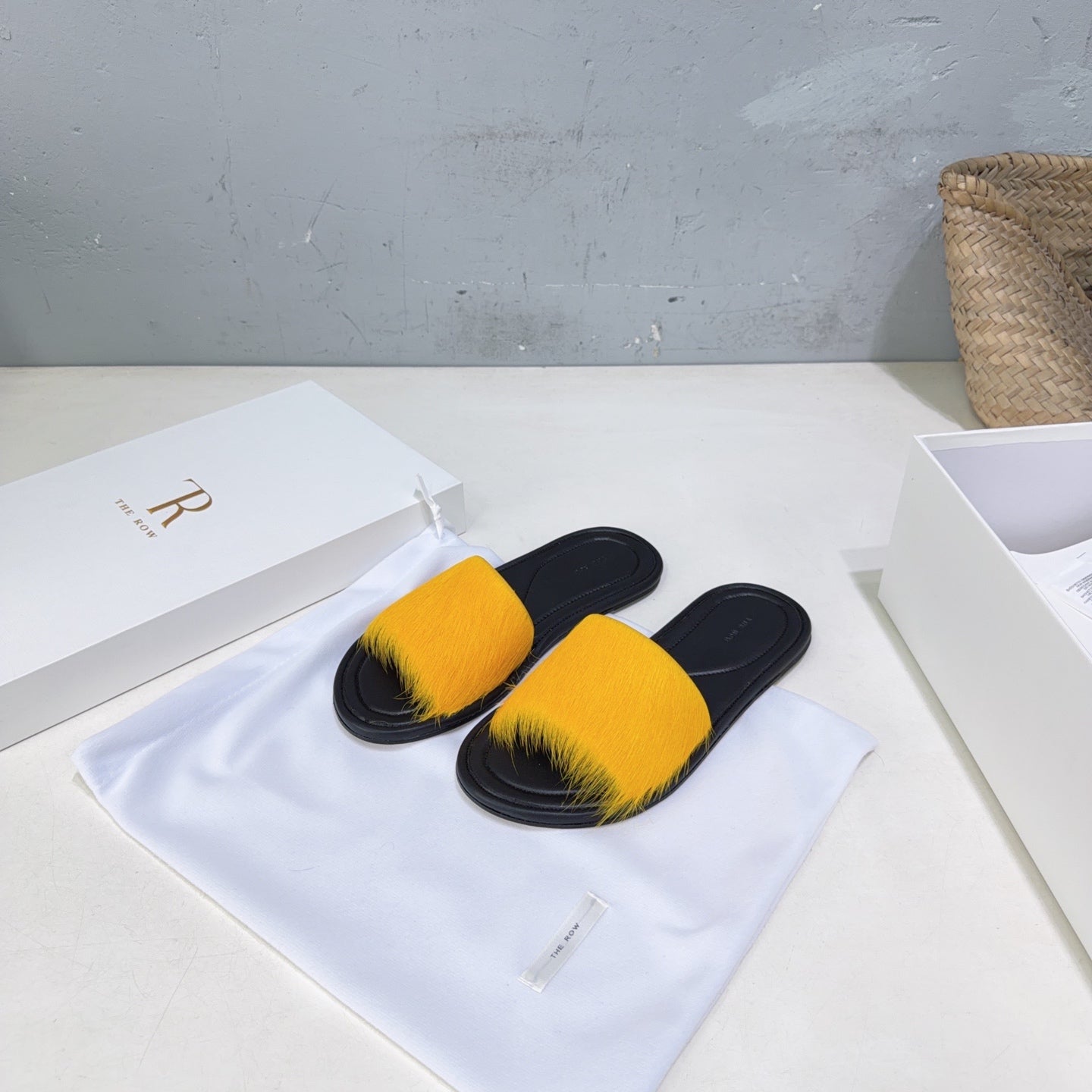 THE ROW 26S SLIDES SANDALS IN YELLOW MINK FUR AND BLACK CALFSKIN