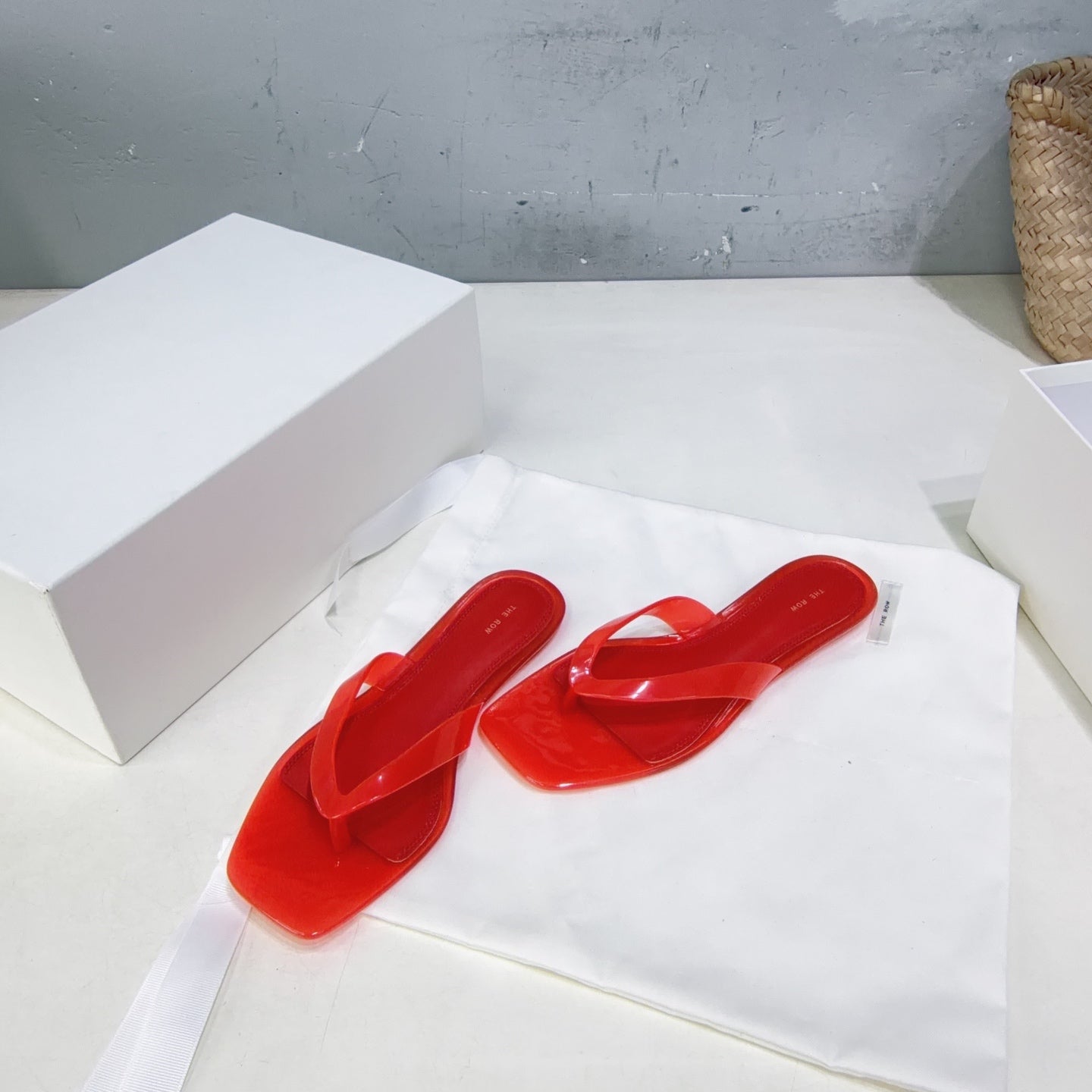 THE ROW 26S SQUARE TOE THONG SANDALS IN TRANSLUCENT RED PVC WITH SILVER FOOTBED