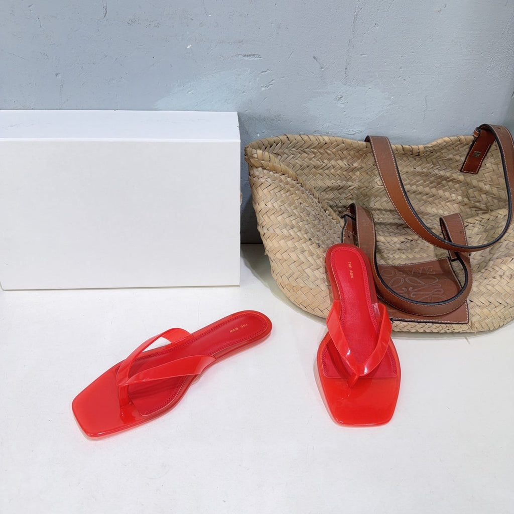 THE ROW 26S SQUARE TOE THONG SANDALS IN TRANSLUCENT RED PVC WITH SILVER FOOTBED