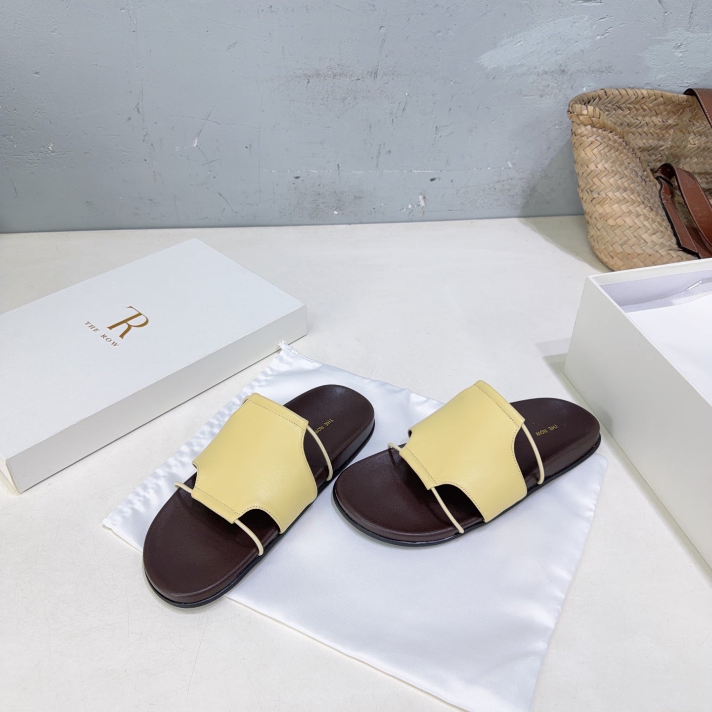 THE ROW 26S STRAP SLIDES IN LIGHT YELLOW CALFSKIN
