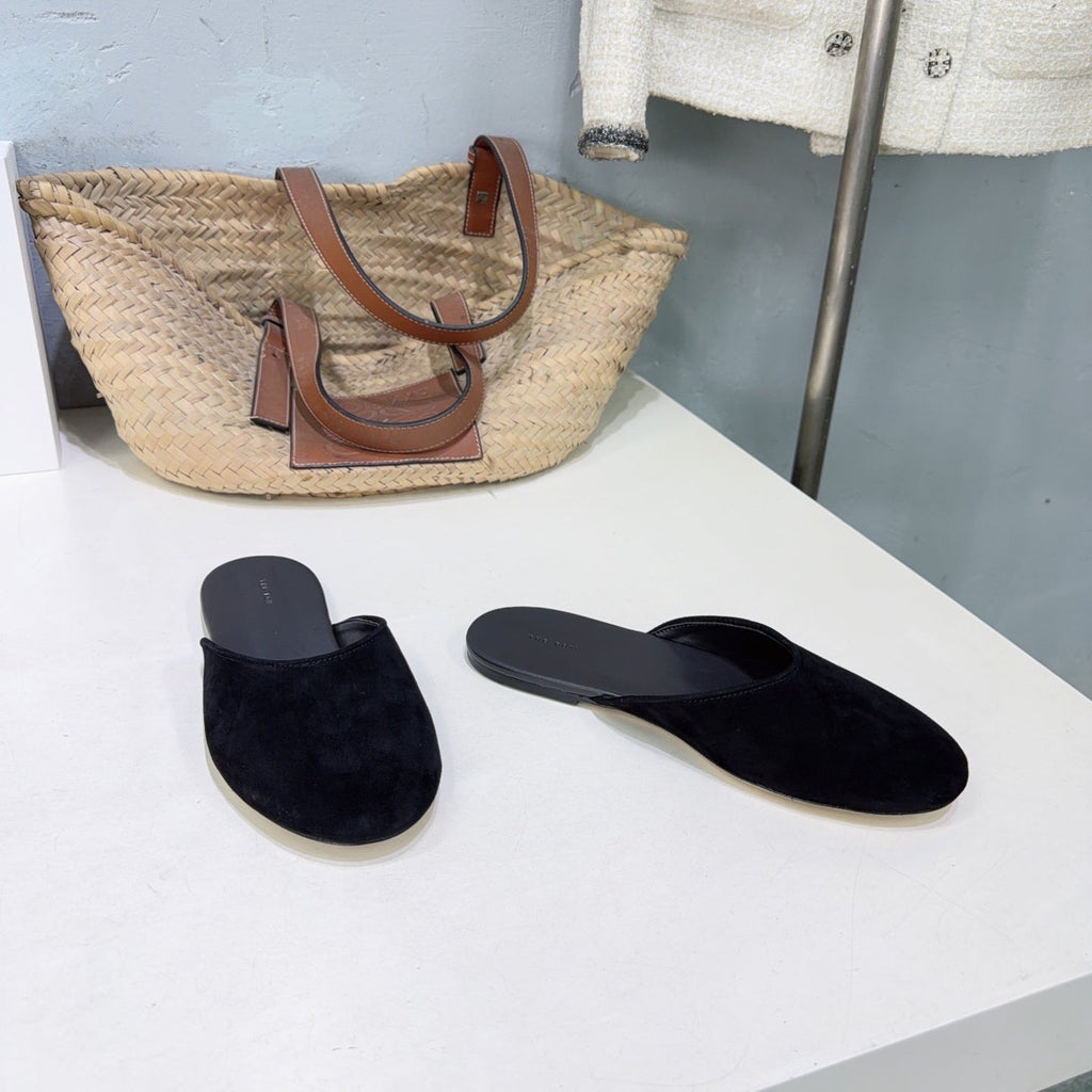 THE ROW 26S ROUND TOE MULE FLATS IN BLACK SUEDE