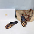 THE ROW 26S ROUND TOE MULE FLATS IN LEOPARD PRINT CALF HAIR CALFSKIN
