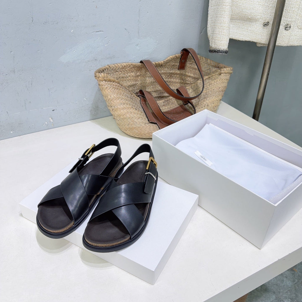 THE ROW 26S CROSS STRAP SANDALS IN BLACK CALFSKIN