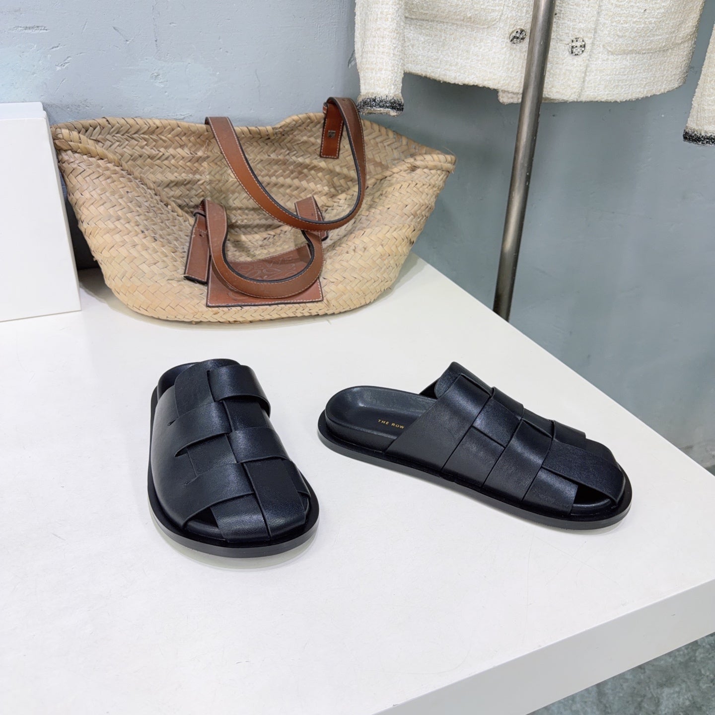 THE ROW 26S CAGE SLIDES IN BLACK SMOOTH CALFSKIN
