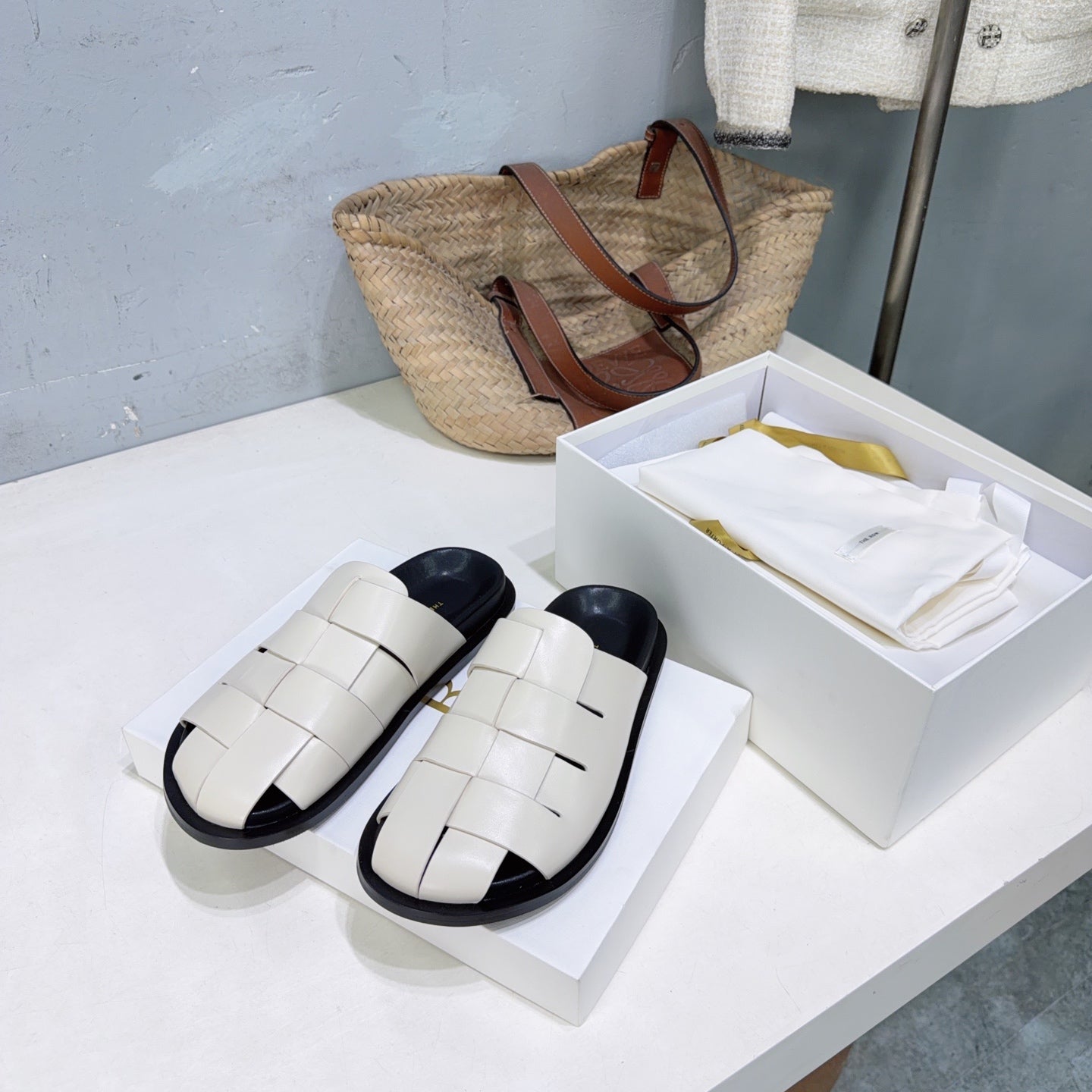THE ROW 26S CAGE SLIDES IN IVORY WHITE SMOOTH CALFSKIN WITH BLACK FOOTBED