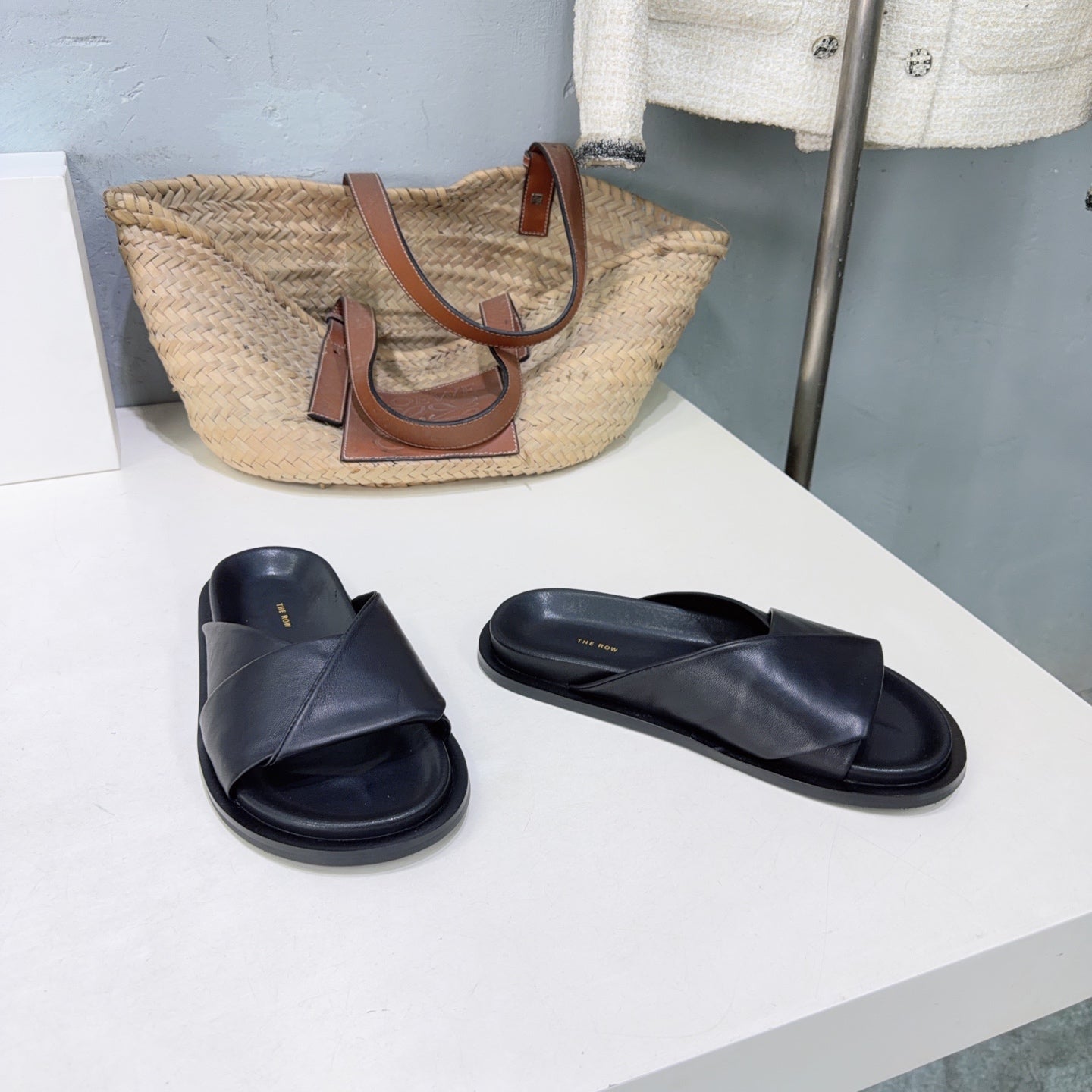 THE ROW 26S CROSS STRAP SLIDES IN BLACK CALFSKIN