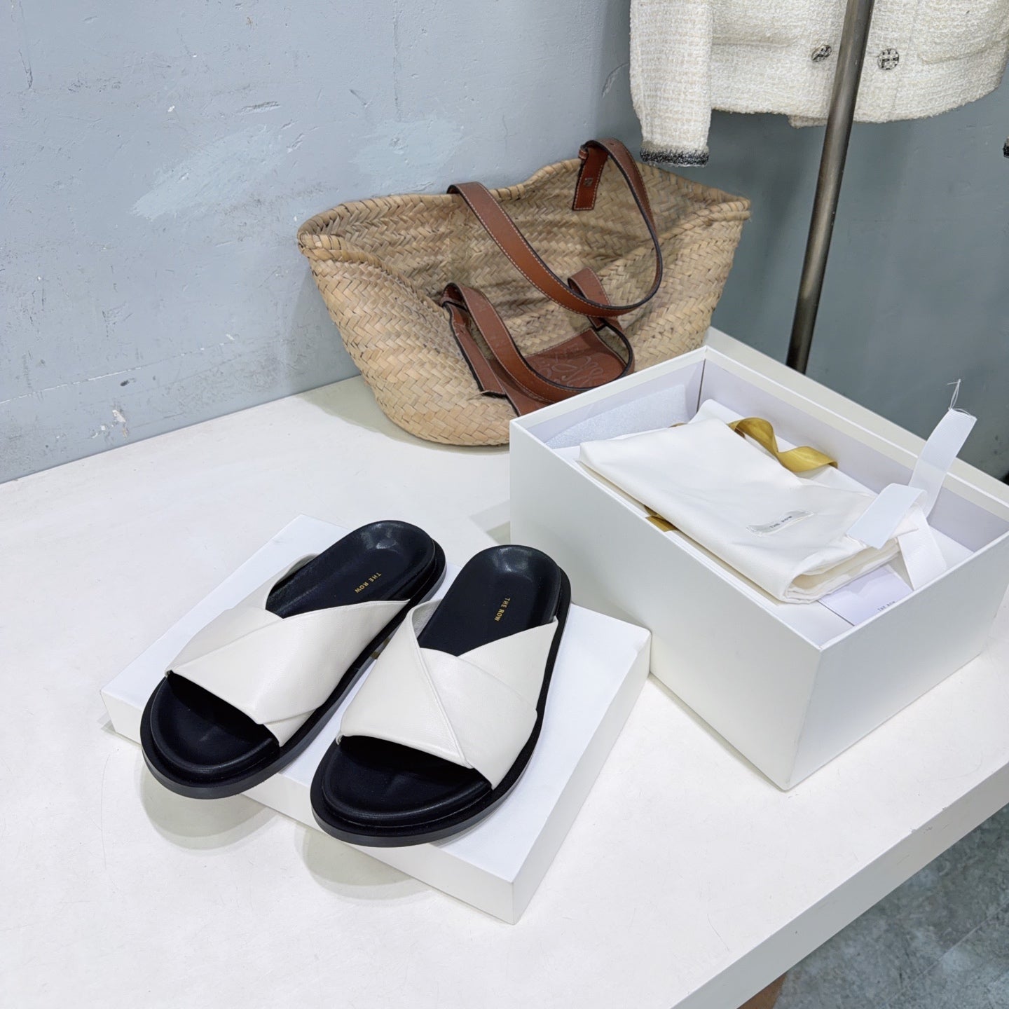 THE ROW 26S CROSS STRAP SLIDES IN IVORY WHITE CALFSKIN WITH BLACK FOOTBED