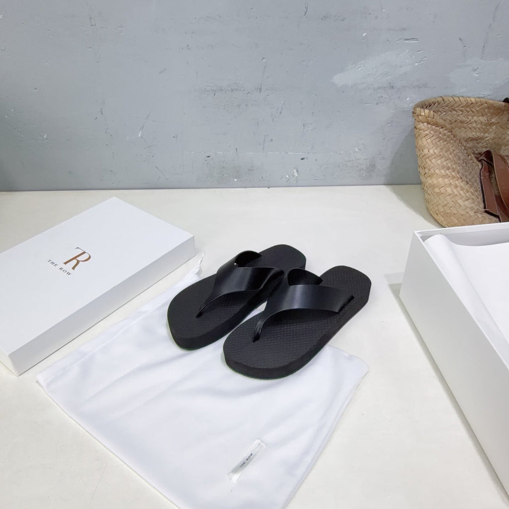 THE ROW 26S THONG SANDALS IN BLACK RUBBER AND CALFSKIN
