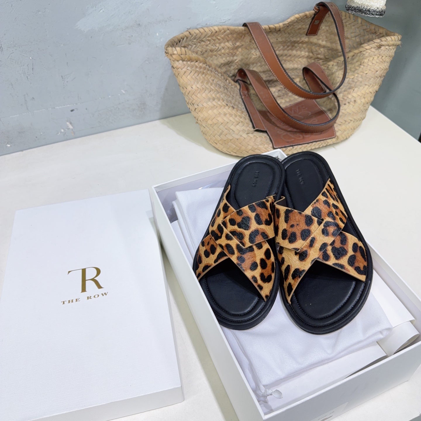 THE ROW 26S SLIDES SANDALS IN LEOPARD CALF HAIR CROSS STRAP