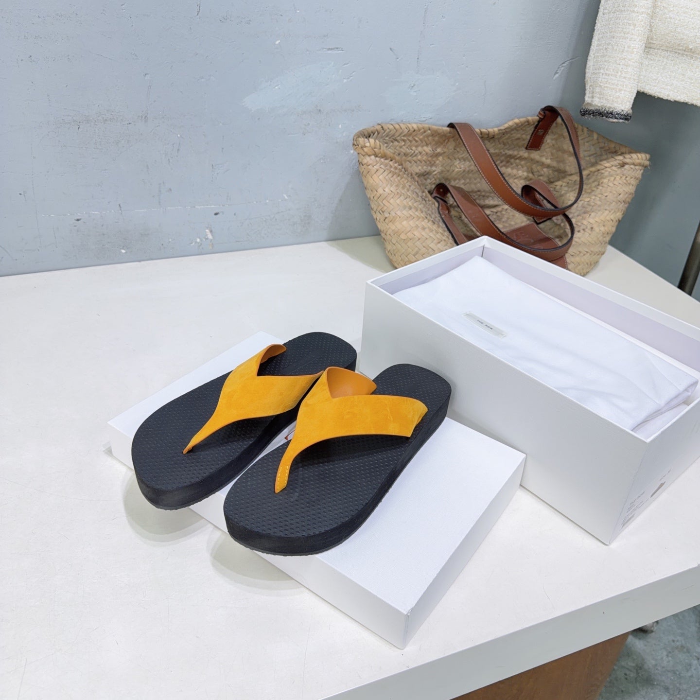THE ROW 26S THONG SANDALS IN BLACK RUBBER  WITH GOLD YELLOW STRAPS