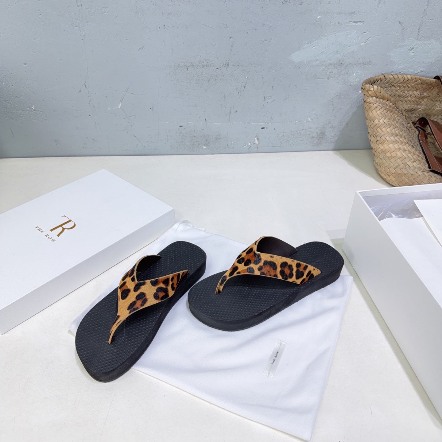 THE ROW 26S THONG SANDALS IN BLACK RUBBER WITH LEOPARD CALF HAIR STRAPS