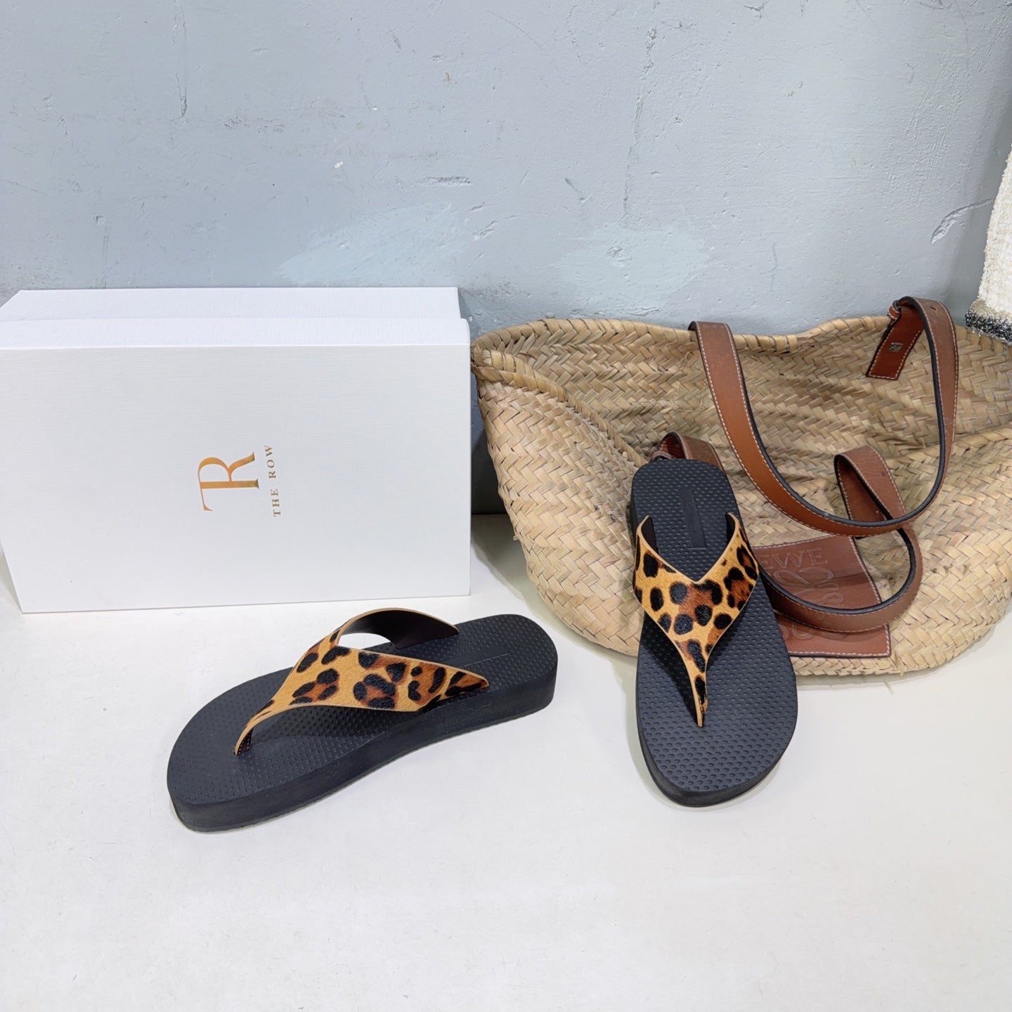 THE ROW 26S THONG SANDALS IN BLACK RUBBER WITH LEOPARD CALF HAIR STRAPS