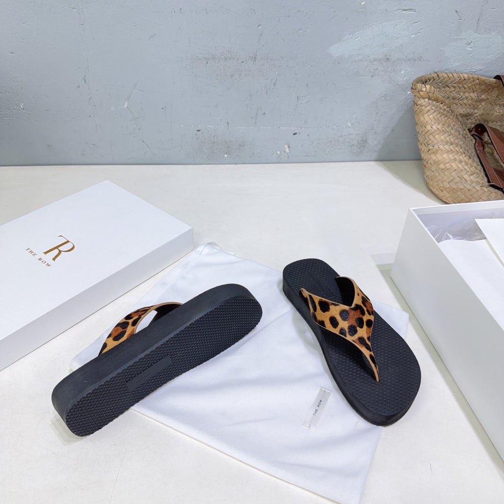 THE ROW 26S THONG SANDALS IN BLACK RUBBER WITH LEOPARD CALF HAIR STRAPS