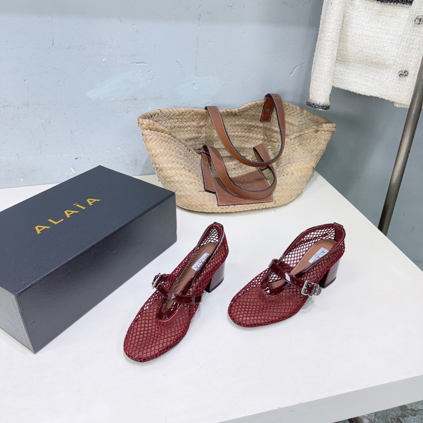 ALAIA 26S HIGH-HEEL MARY JANES 50 MM IN DARK RED WOVEN MESH