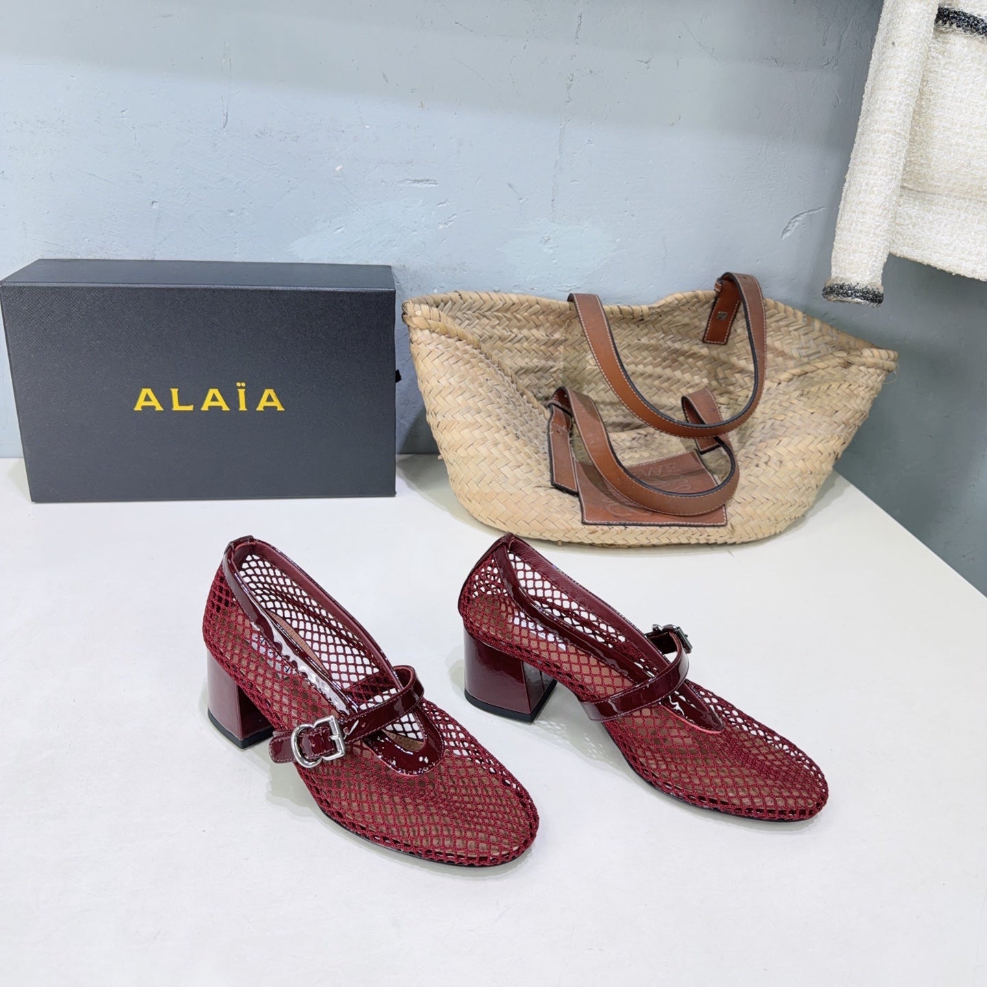 ALAIA 26S HIGH-HEEL MARY JANES 50 MM IN DARK RED WOVEN MESH
