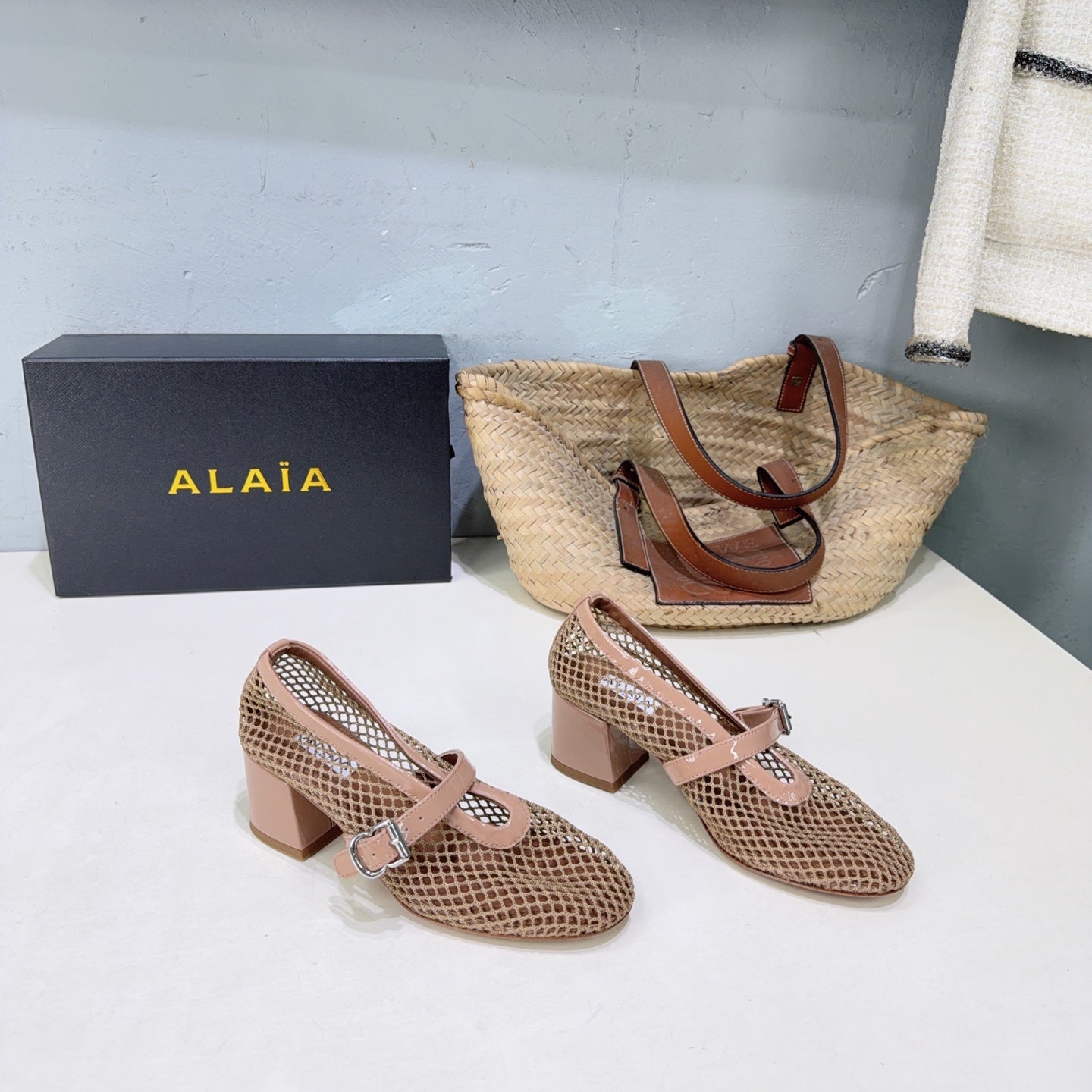 ALAIA 26S HIGH-HEEL MARY JANES 50 MM IN NUDE WOVEN MESH