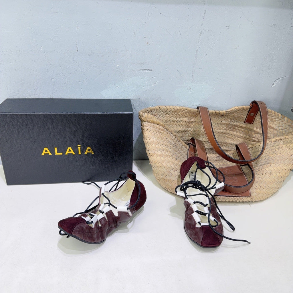 ALAIA 26S LACE-UP BALLET FLATS IN MERLOT RED LAMBSKIN AND SUEDE