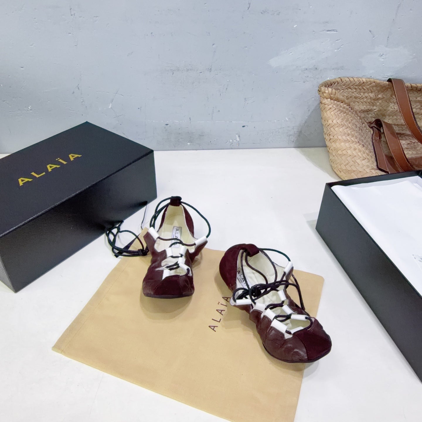 ALAIA 26S LACE-UP BALLET FLATS IN MERLOT RED LAMBSKIN AND SUEDE