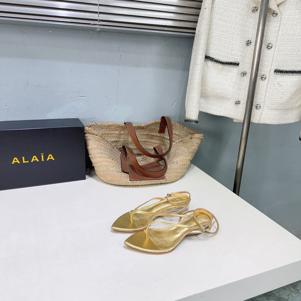 ALAIA 26S THONG SANDALS IN GOLD CALFSKIN
