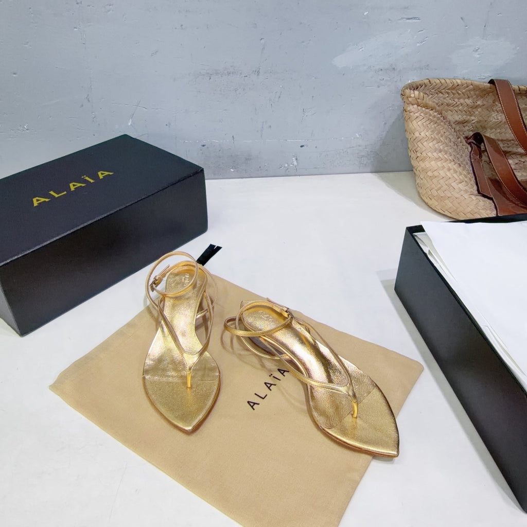 ALAIA 26S THONG SANDALS IN GOLD CALFSKIN