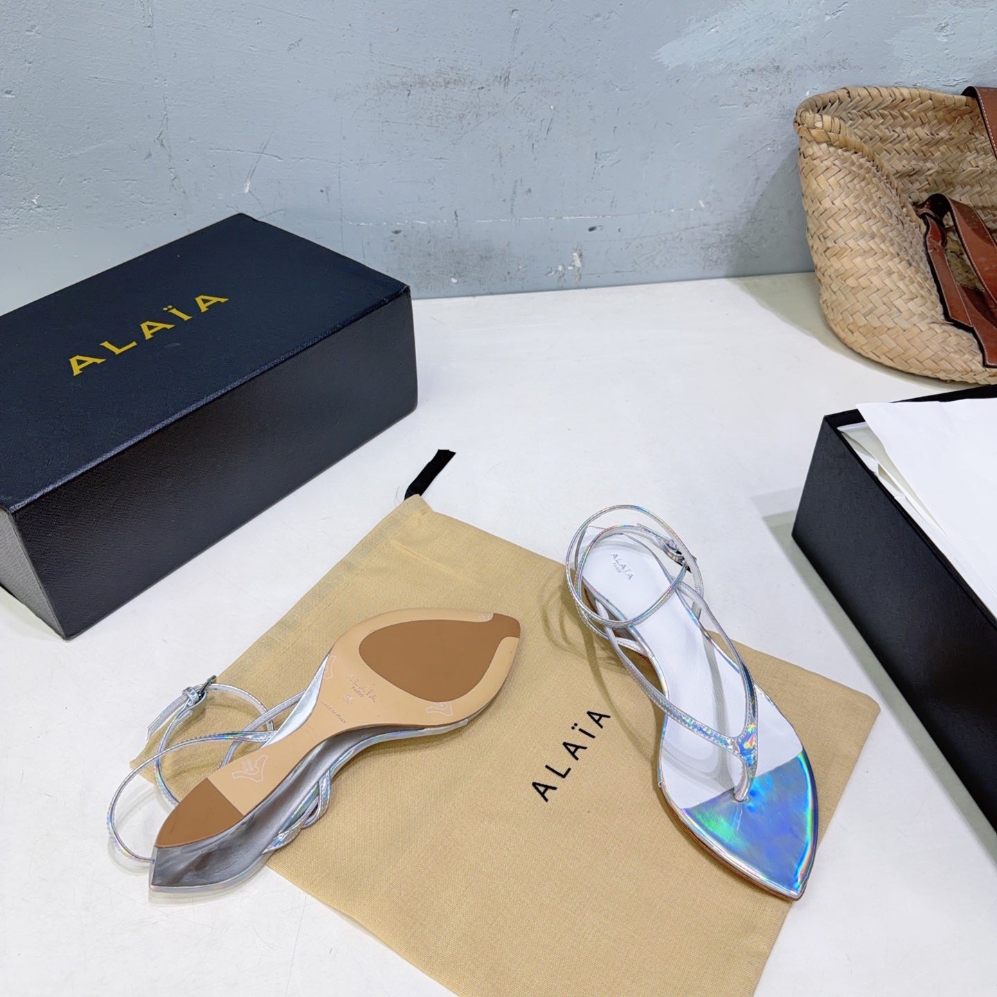 ALAIA 26S THONG SANDALS IN SILVER METALLIC CALFSKIN