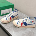 ELIOT SNEAKER IN WHITE CANVAS WITH NAVY BLUE CALFSKIN