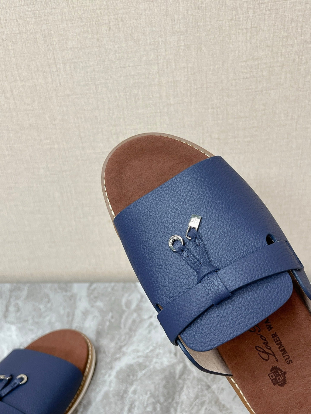 LP 26S LOCK CHARM SLIDES IN NAVY BLUE CALFSKIN SILVER HARDWARE
