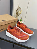 ALO 25S SALOMON ODYSSEY ELMT SNEAKER 45 MM IN DARK ORANGE FABRIC