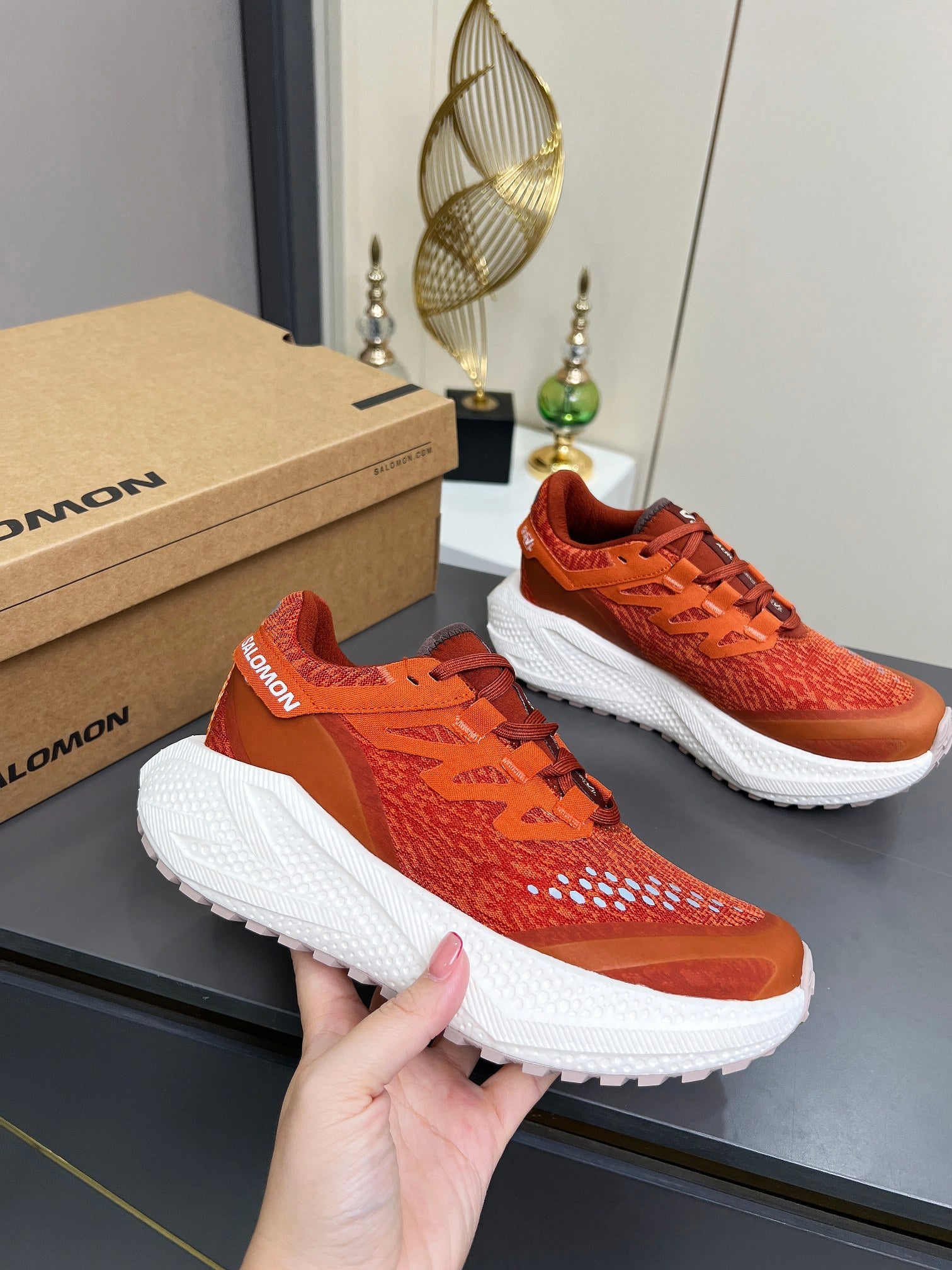 ALO 25S SALOMON ODYSSEY ELMT SNEAKER 45 MM IN DARK ORANGE FABRIC