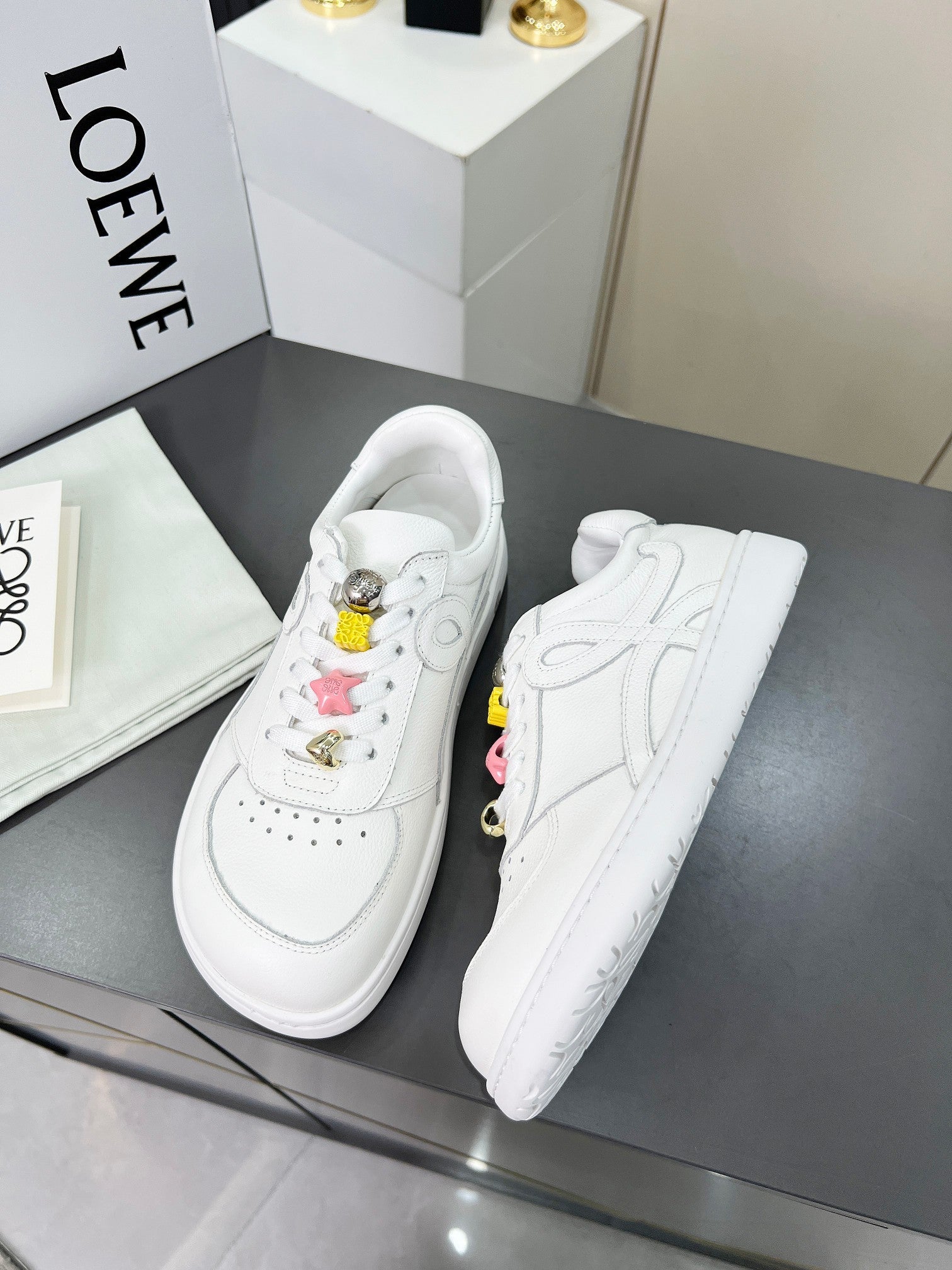LOEWE 26S LOW TOP SNEAKERS IN WHITE CALFSKIN WITH CHARM LACES