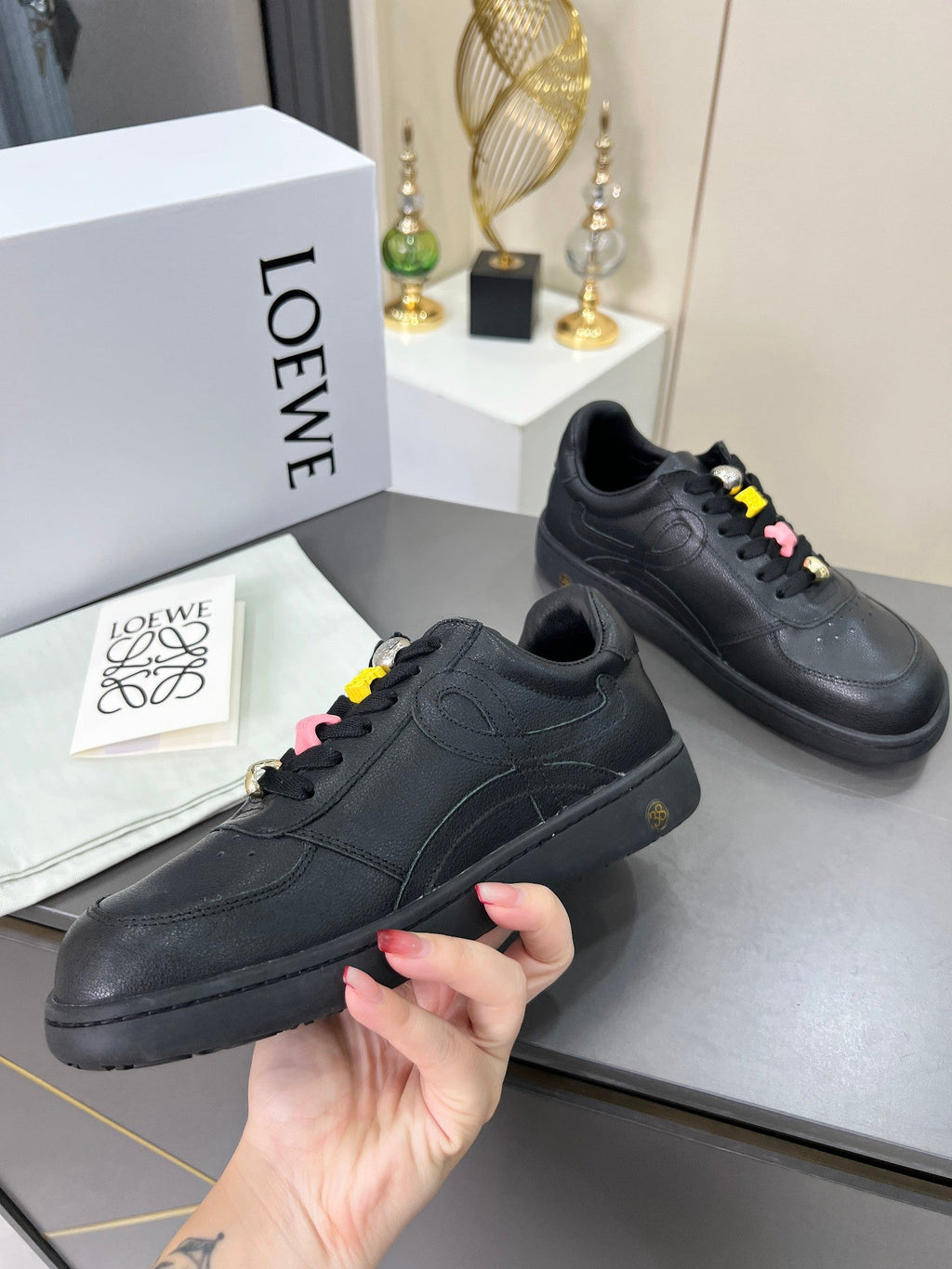 LOEWE 26S LOW TOP SNEAKERS IN BLACK CALFSKIN WITH CHARM LACES