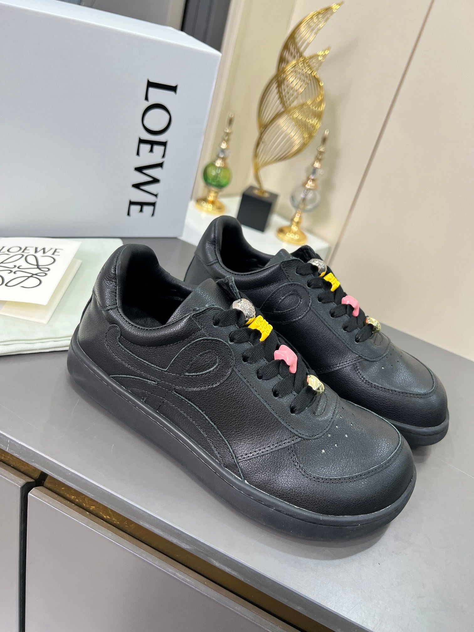 LOEWE 26S LOW TOP SNEAKERS IN BLACK CALFSKIN WITH CHARM LACES
