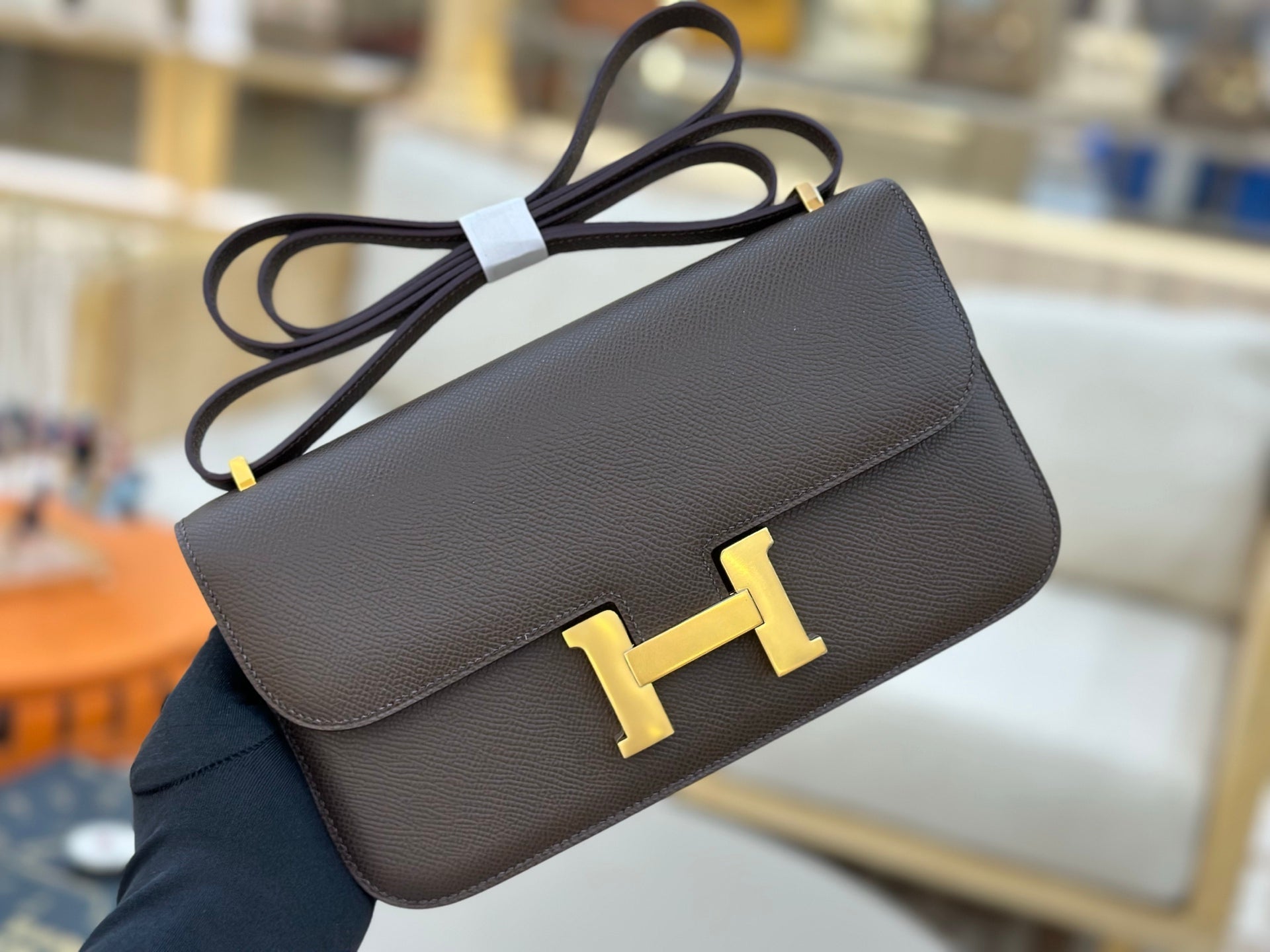 HM 25S CONSTANCE ELAN 24 CM IN DARK GREY BROWN EPSOM WITH GOLD HARDWARE