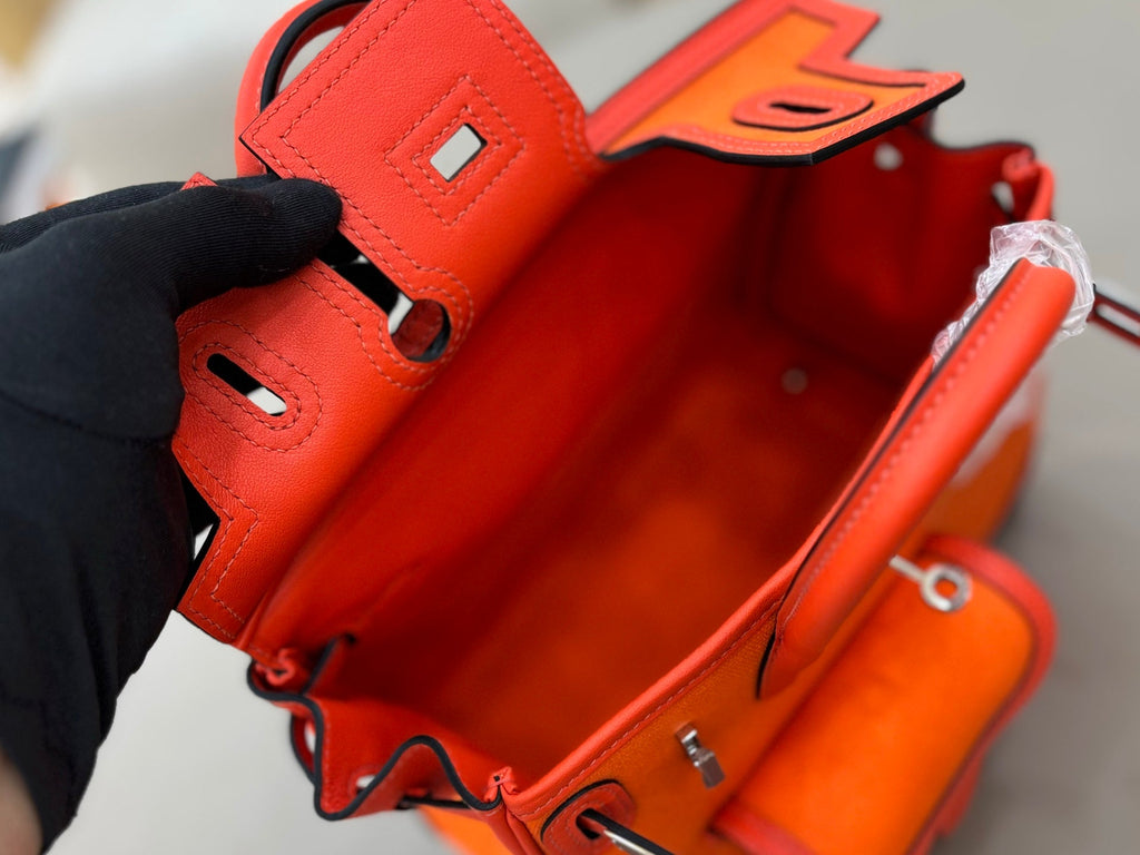HM 25S BIRKIN CARGO 25 CM IN DARK ORANGE CANVAS AND SWIFT WITH SILVER HARDWARE
