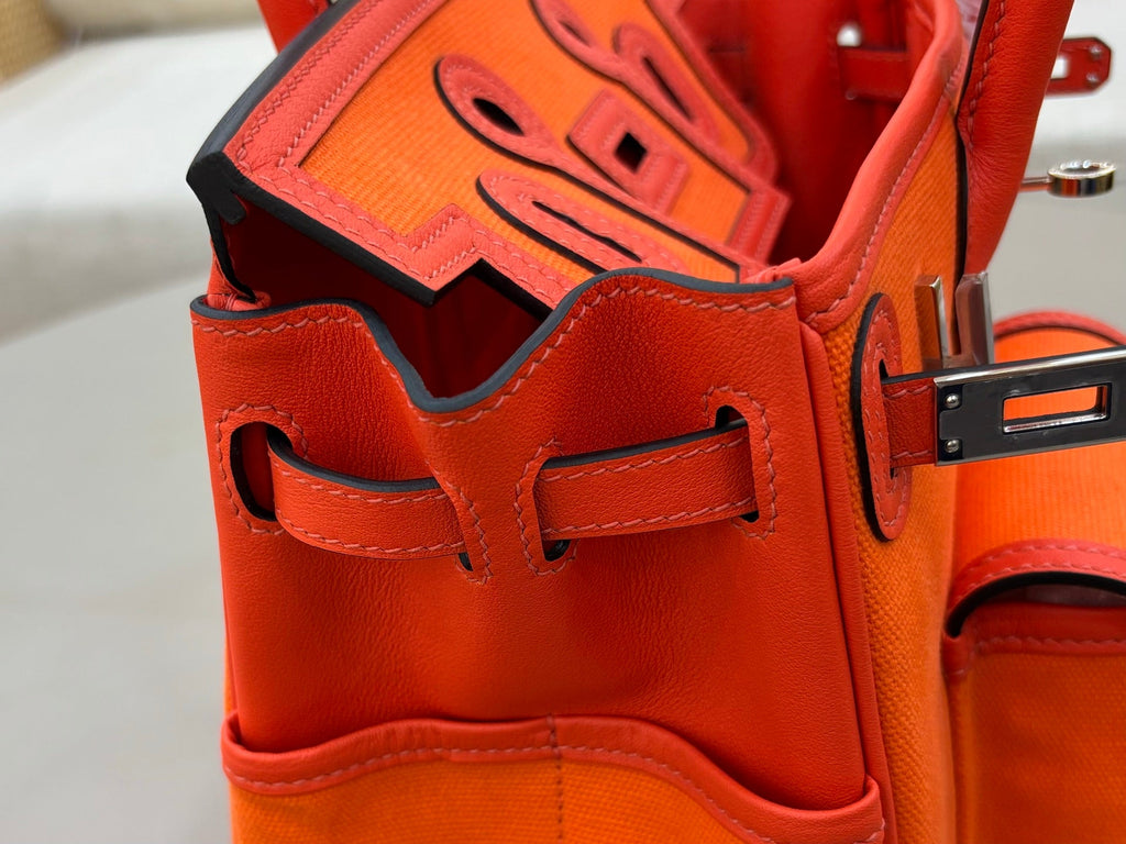 HM 25S BIRKIN CARGO 25 CM IN DARK ORANGE CANVAS AND SWIFT WITH SILVER HARDWARE