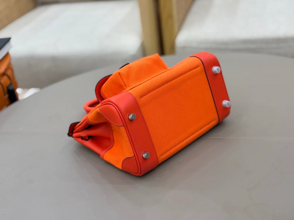 HM 25S BIRKIN CARGO 25 CM IN DARK ORANGE CANVAS AND SWIFT WITH SILVER HARDWARE